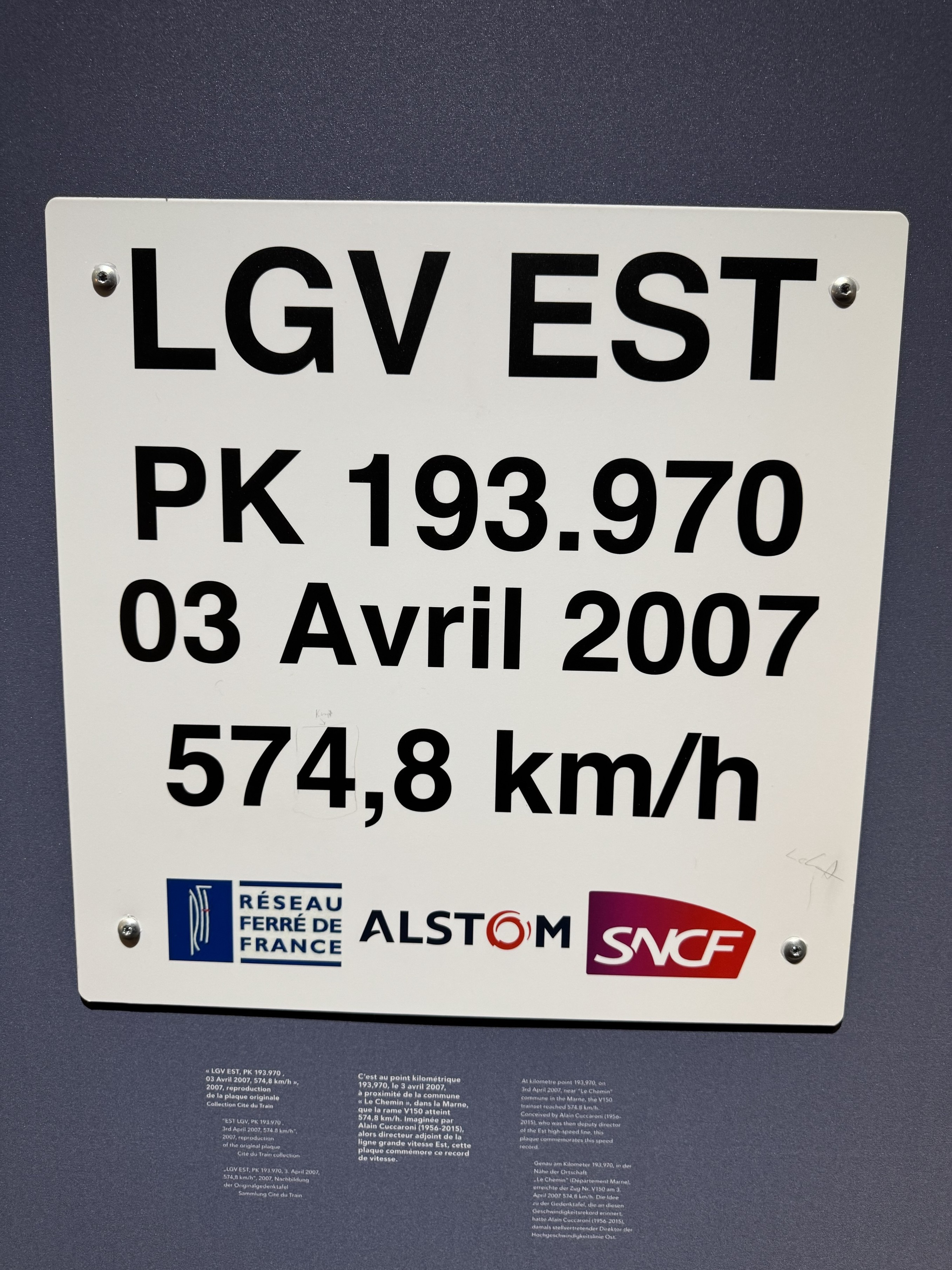 Replica of commemorative plaque that can be found at km marker 193.970 of LGV Est. The record of 574.8 km/h was reached on the 3rd of April 2007. Replica of commemorative plaque that can be found at km marker 193.970 of LGV Est. The record of 574.8 km/h was reached on the 3rd of April 2007.